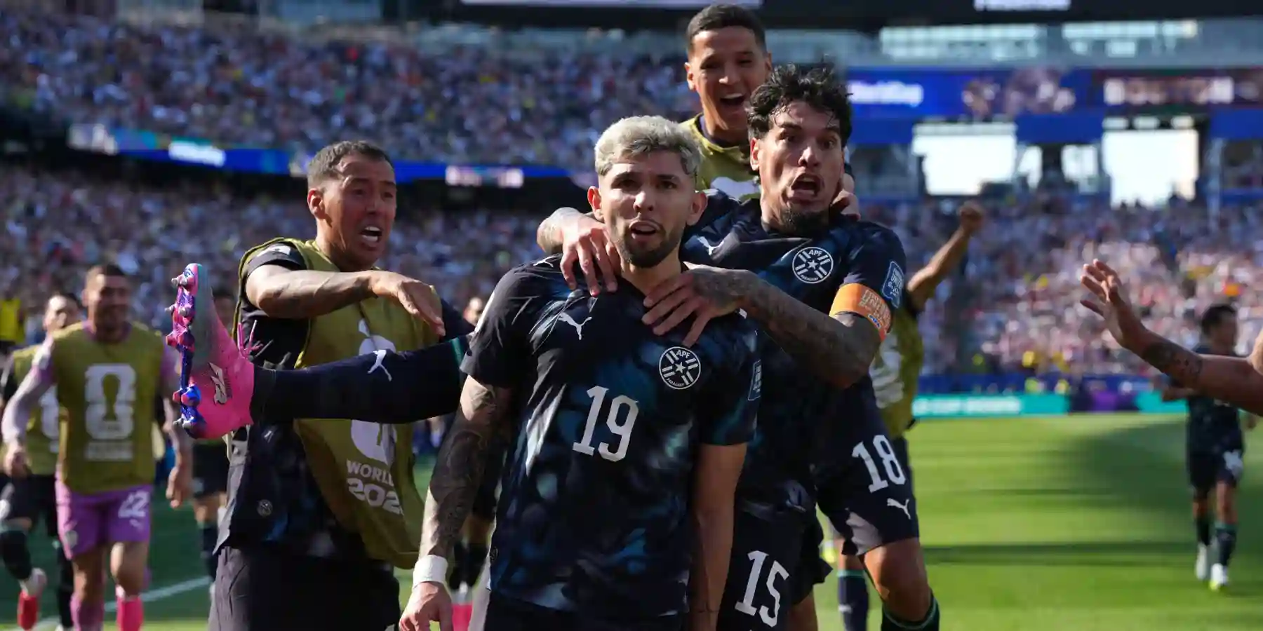 Paraguay players celebrate after scoring against Germany