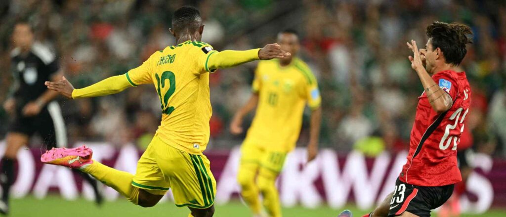 South Africa player shoots toward South Korea's goal