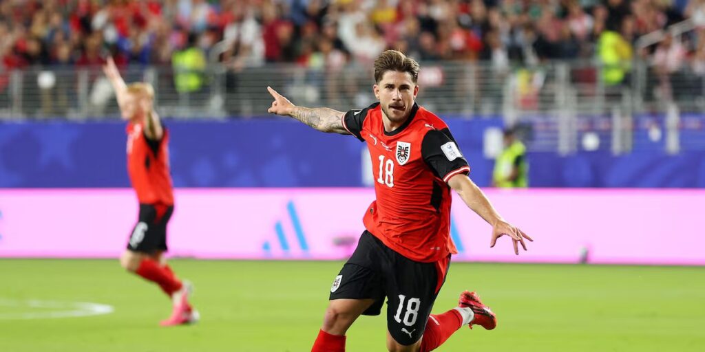 Romano Schmid celebrates after scoring against Jordan