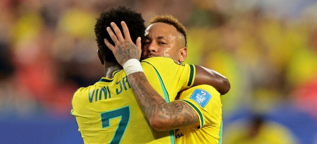 Vinicius Jr and Neymar hugging each other