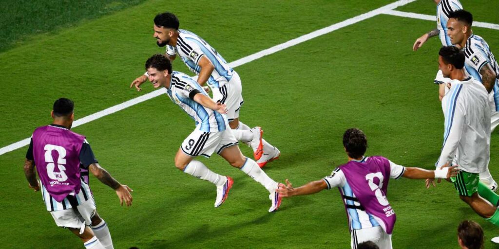 Argentina players celebrate after Julian Alvarez' goal against Switzerland