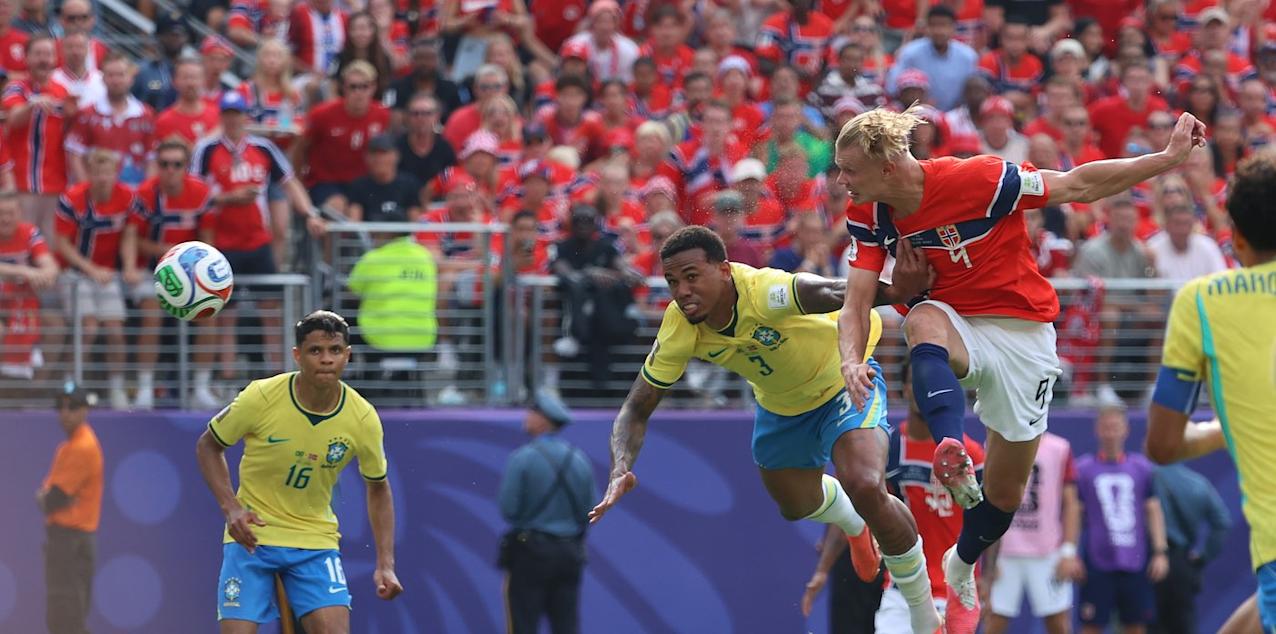 Erling Haaland scores a header against Brazil