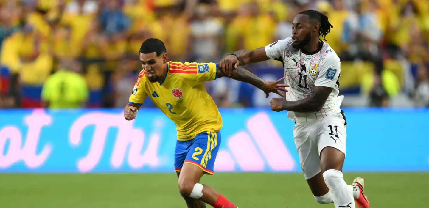 Daniel Munoz and Antoine Semenyo in a battle for the ball