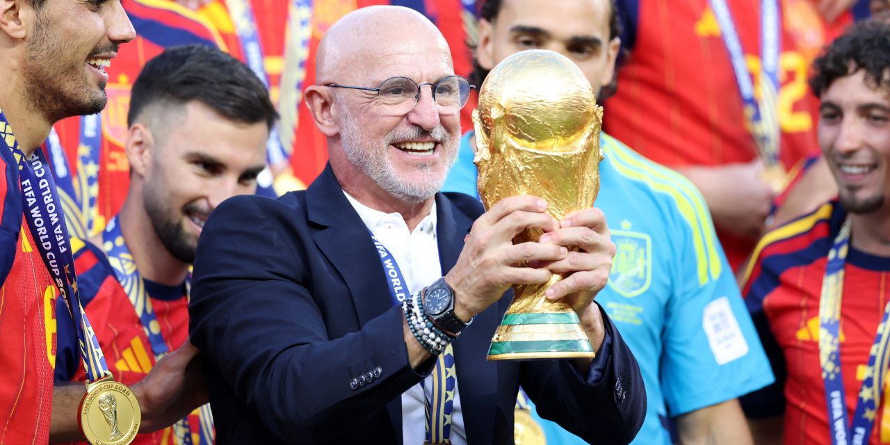 Spain head coach Luis de la Fuente with the World Cup trophy