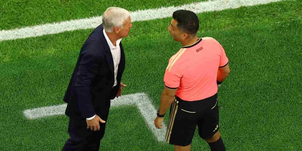 Didier Deschamps talking to a referee