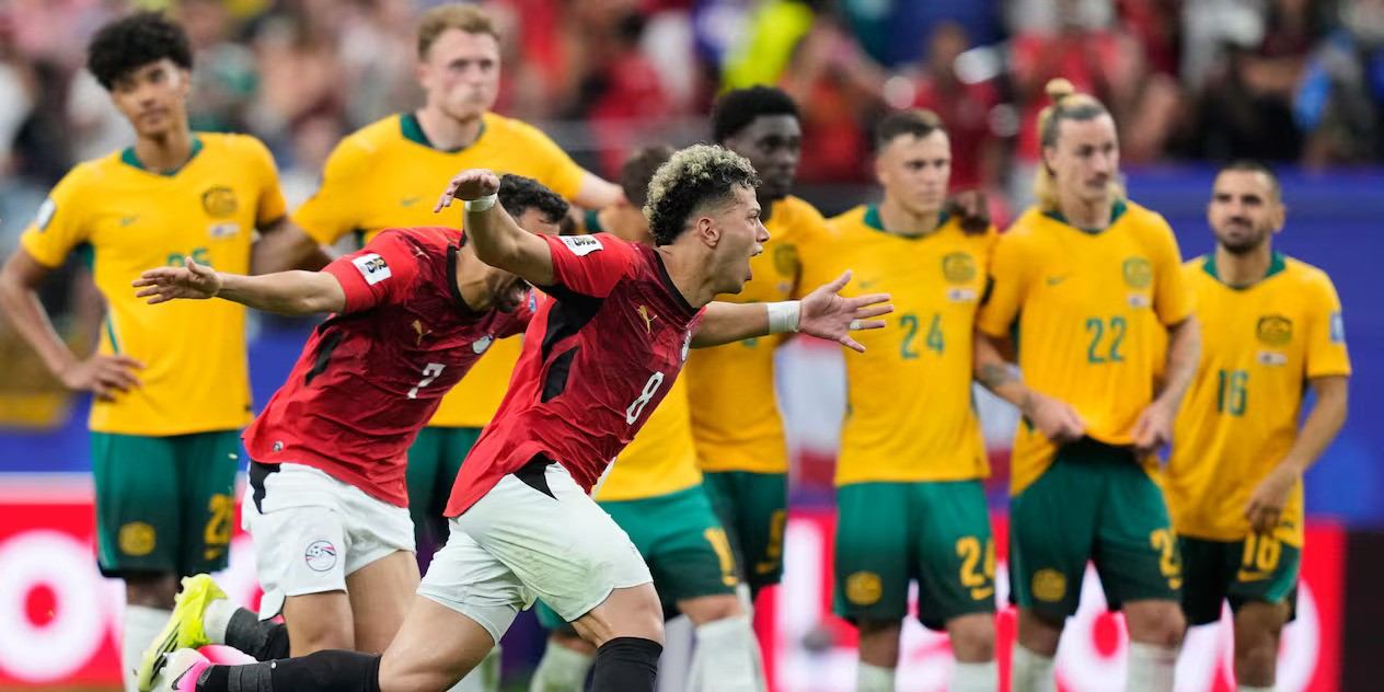 Egypt players rush to celebrate after eliminating Australia on penalties