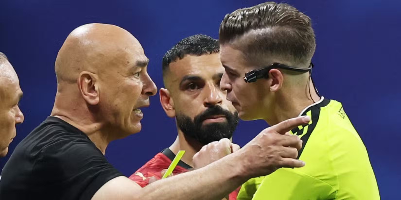 Egypt head coach Hossam Hassan protests against the referee
