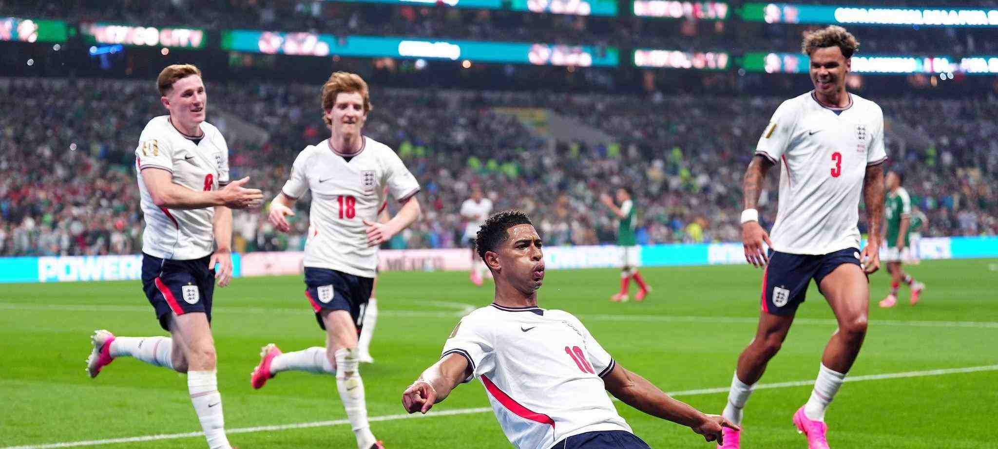 England players celebrate after scoring against Mexico