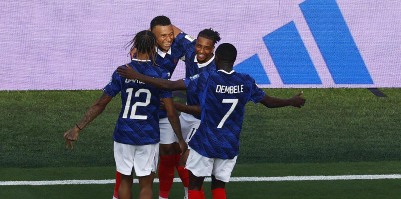 France players celebrate after scoring against Sweden