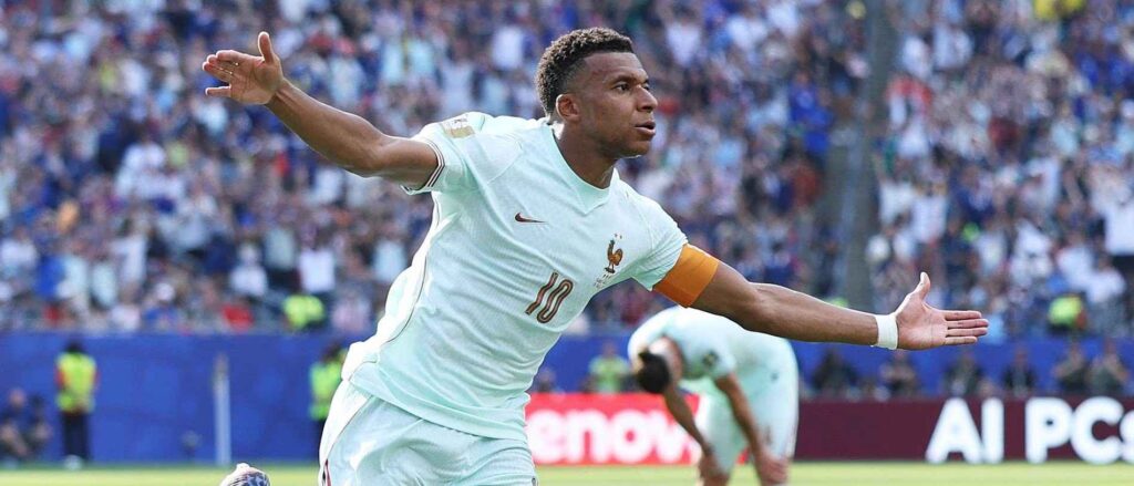 Kylian Mbappe celebrates after scoring against Morocco
