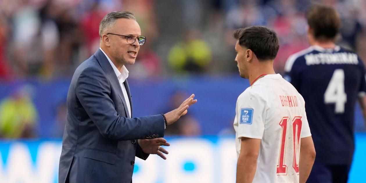 Morocco head coach Mohamed Ouahbi giving instructions to Brahim Diaz