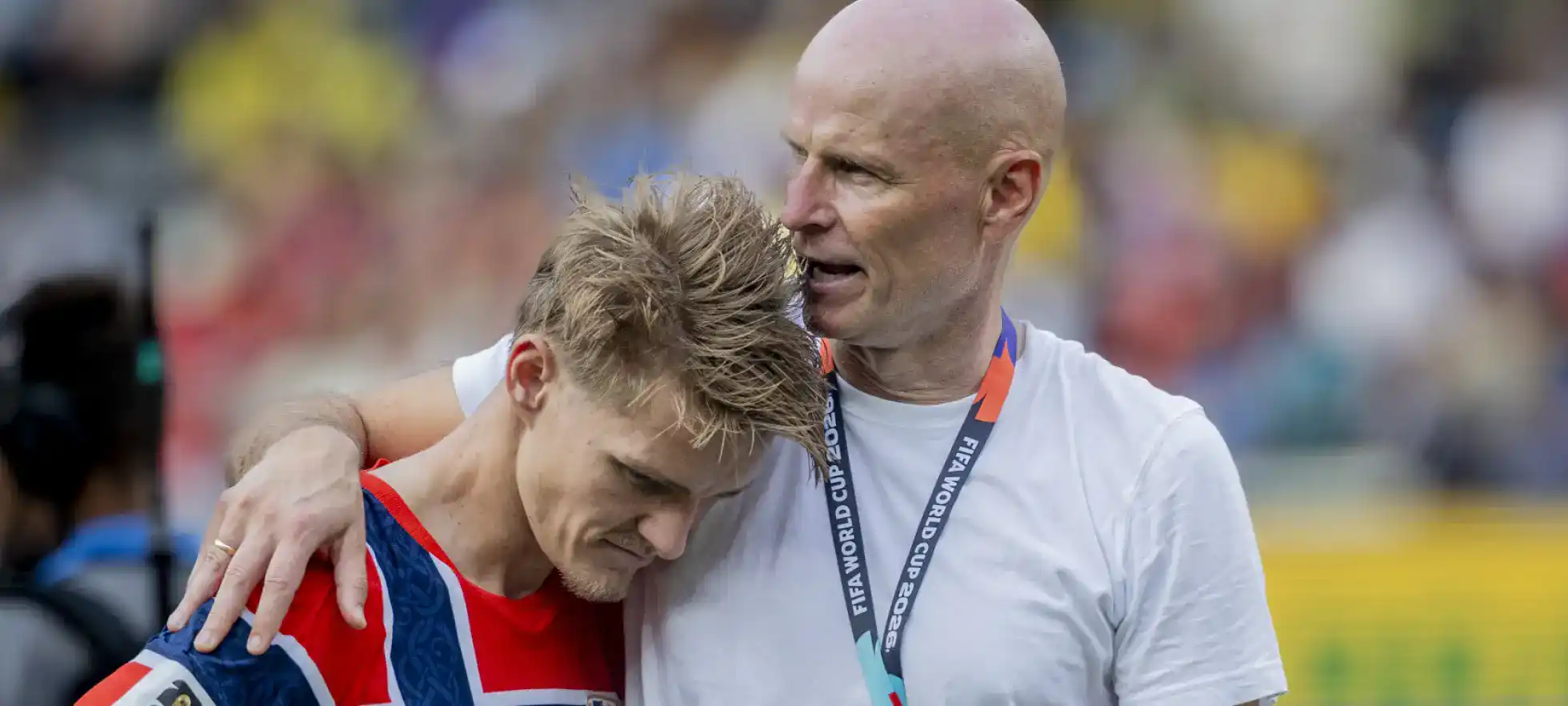 Norway head coach Stale Solbakken giving Marten Odegaard a hug