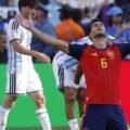 Mikel Merino celebrates Spain's goal against Argentina