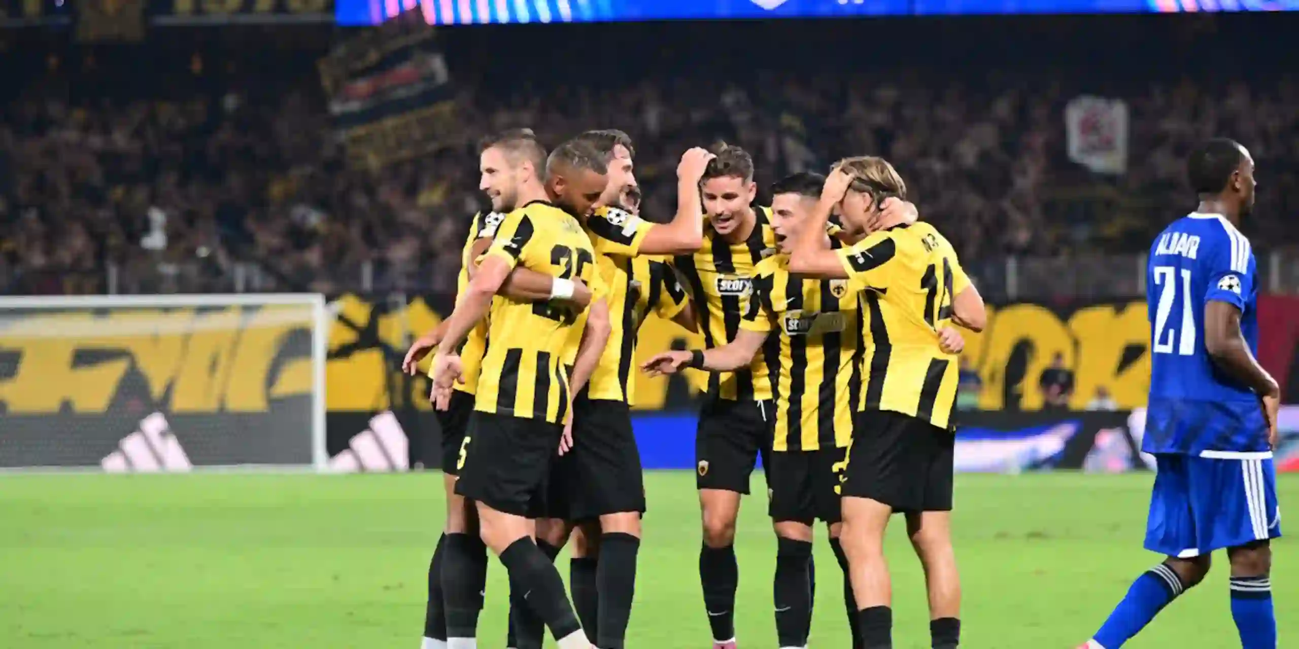 AEK players congratulate one another after scoring against Levski