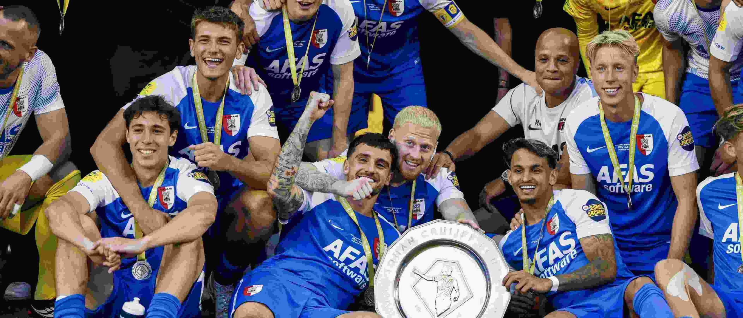 AZ players celebrate with the Johan Cruyff Shield
