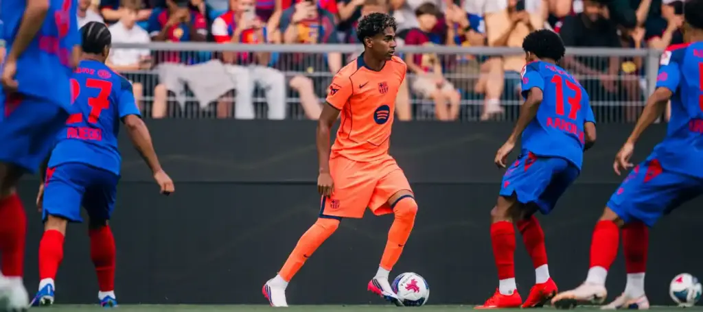 Lamine Yamal with the ball during the pre-season friendly between Basel and Barcelona