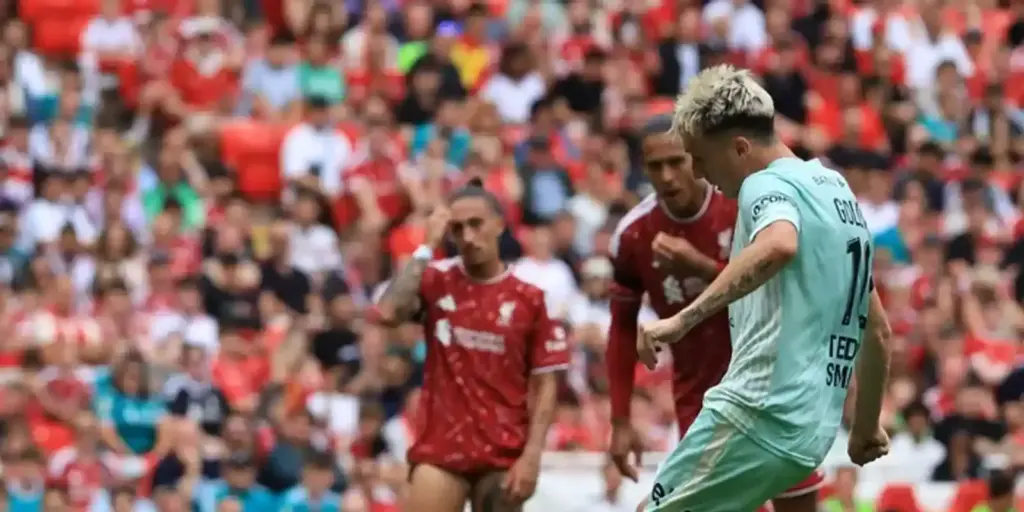 Aleksandr Golovin shoots toward Liverpool's goal