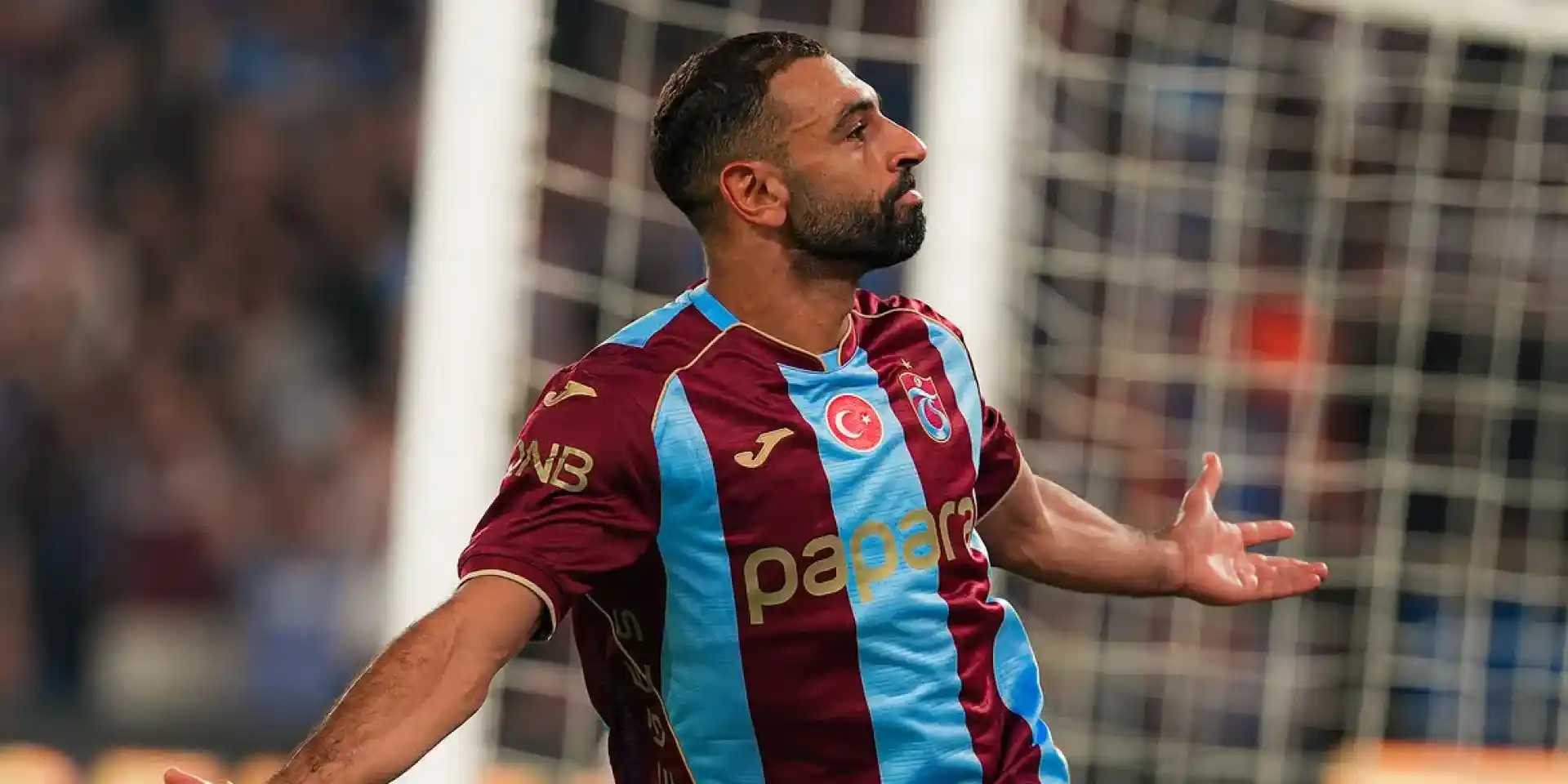 Mohamed Salah celebrates after scoring for Trabzonspor