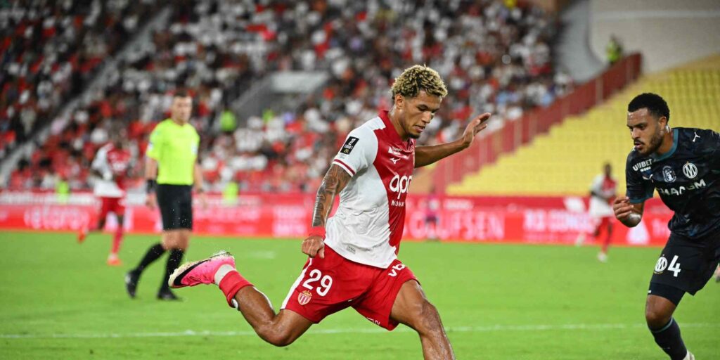Monaco's player Brunner shoots at Marseille's goal