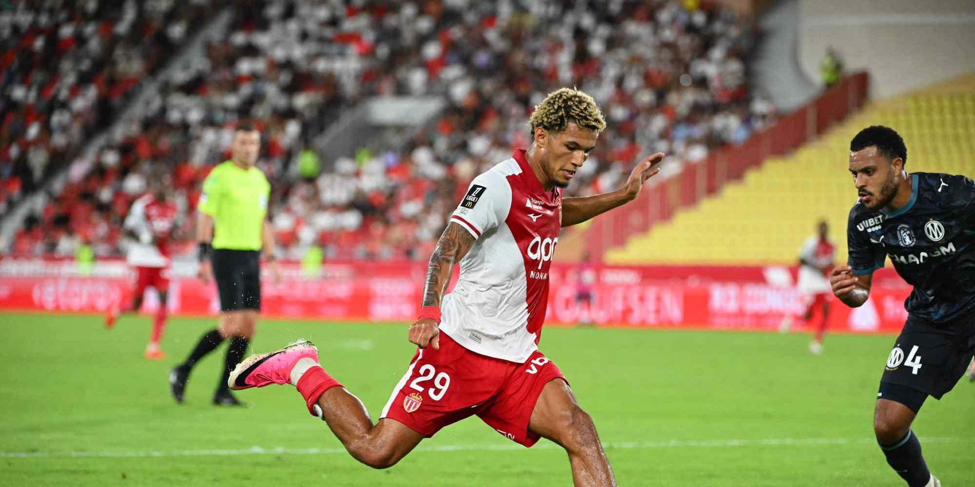 Monaco's player Brunner shoots at Marseille's goal