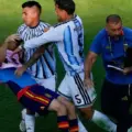 Leandro Paredes pushing Gavi to the ground