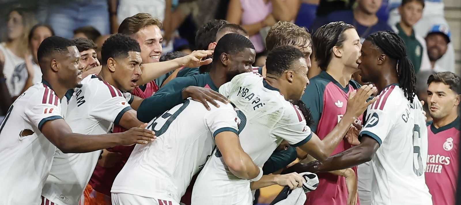 Real Madrid players celebrate after scoring against Espanyol