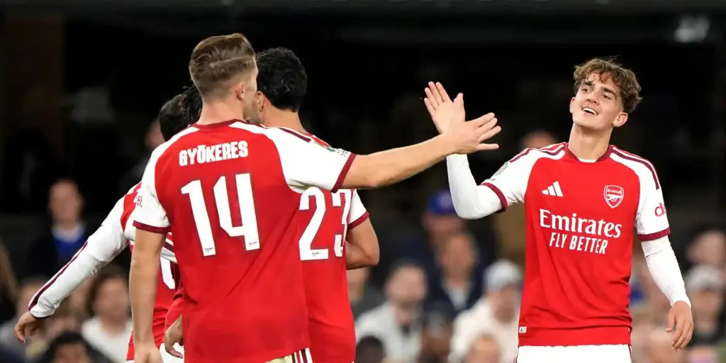 Viktor Gyokeres and Max Dowman high-fiving after scoring against Ipswich
