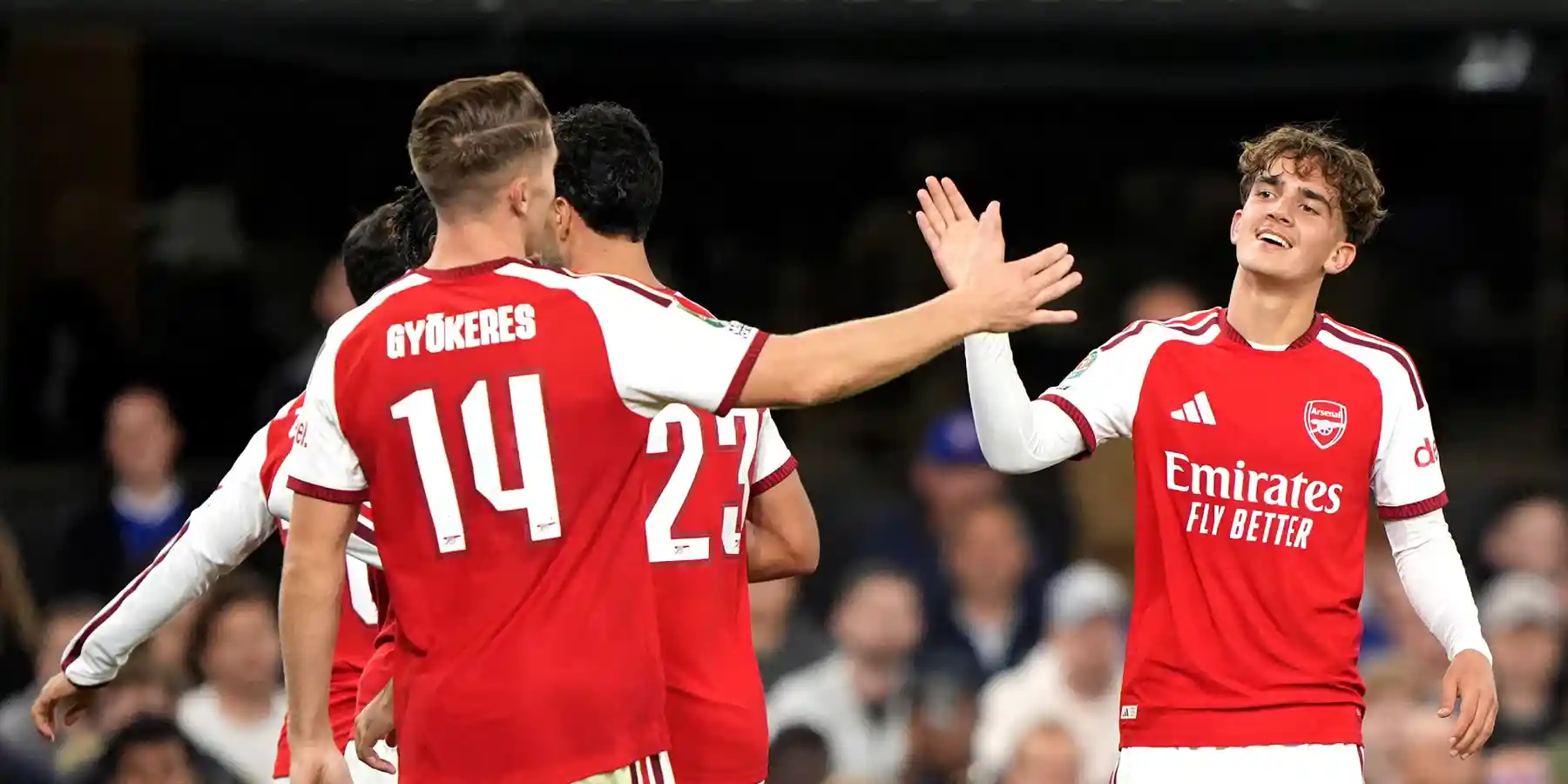 Viktor Gyokeres and Max Dowman high-fiving after scoring against Ipswich