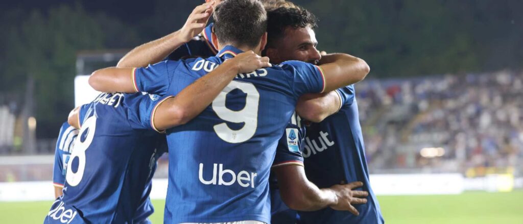 Como players celebrate after scoring against Parma