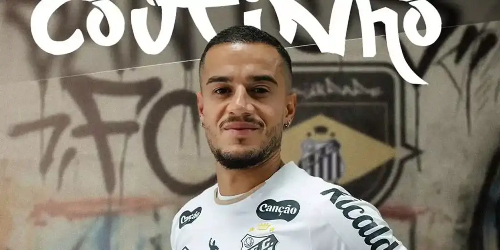Phillipe Coutinho posing with Santos shirt