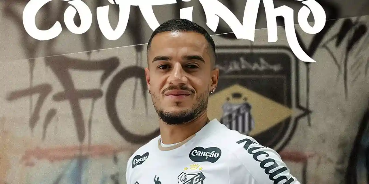 Phillipe Coutinho posing with Santos shirt