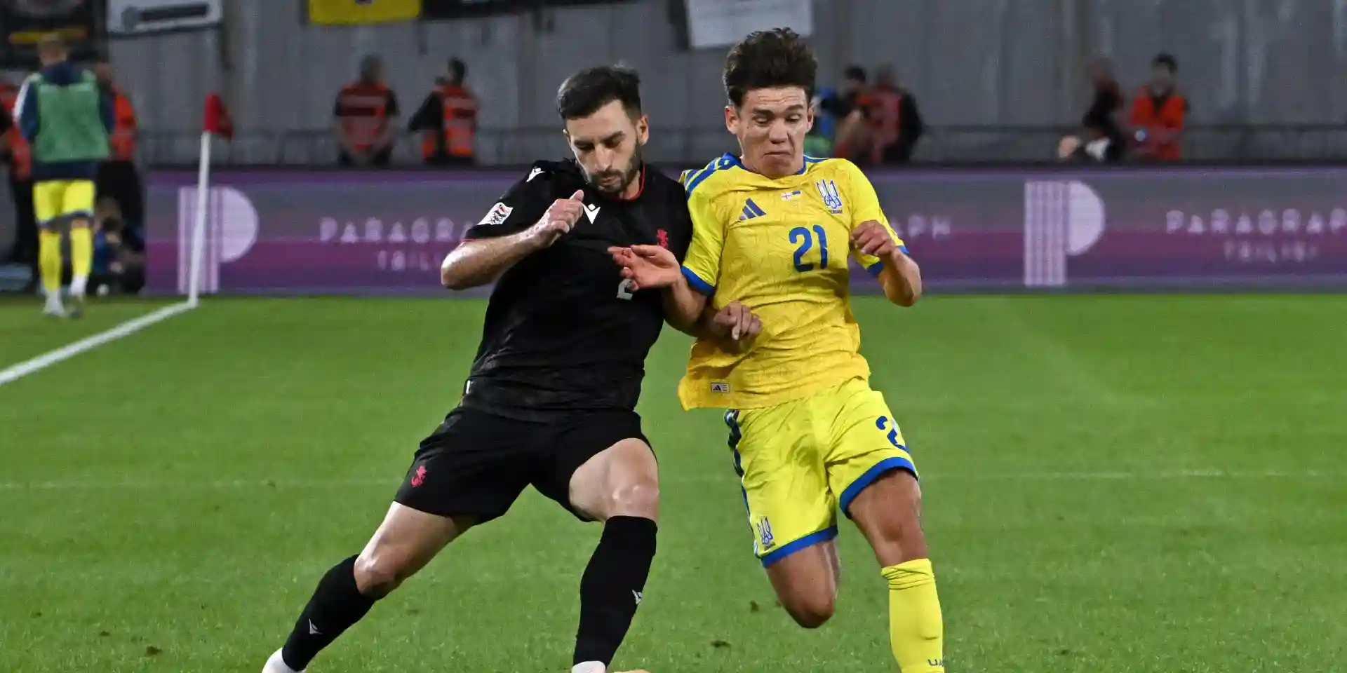Georgia and Ukraine players in a battle for the ball