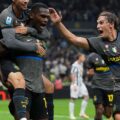 Inter players celebrate after scoring against Udinese