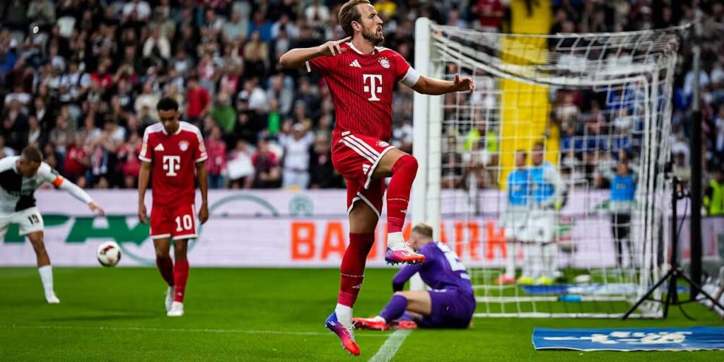 Harry Kane celebrates after scoring against Elversberg