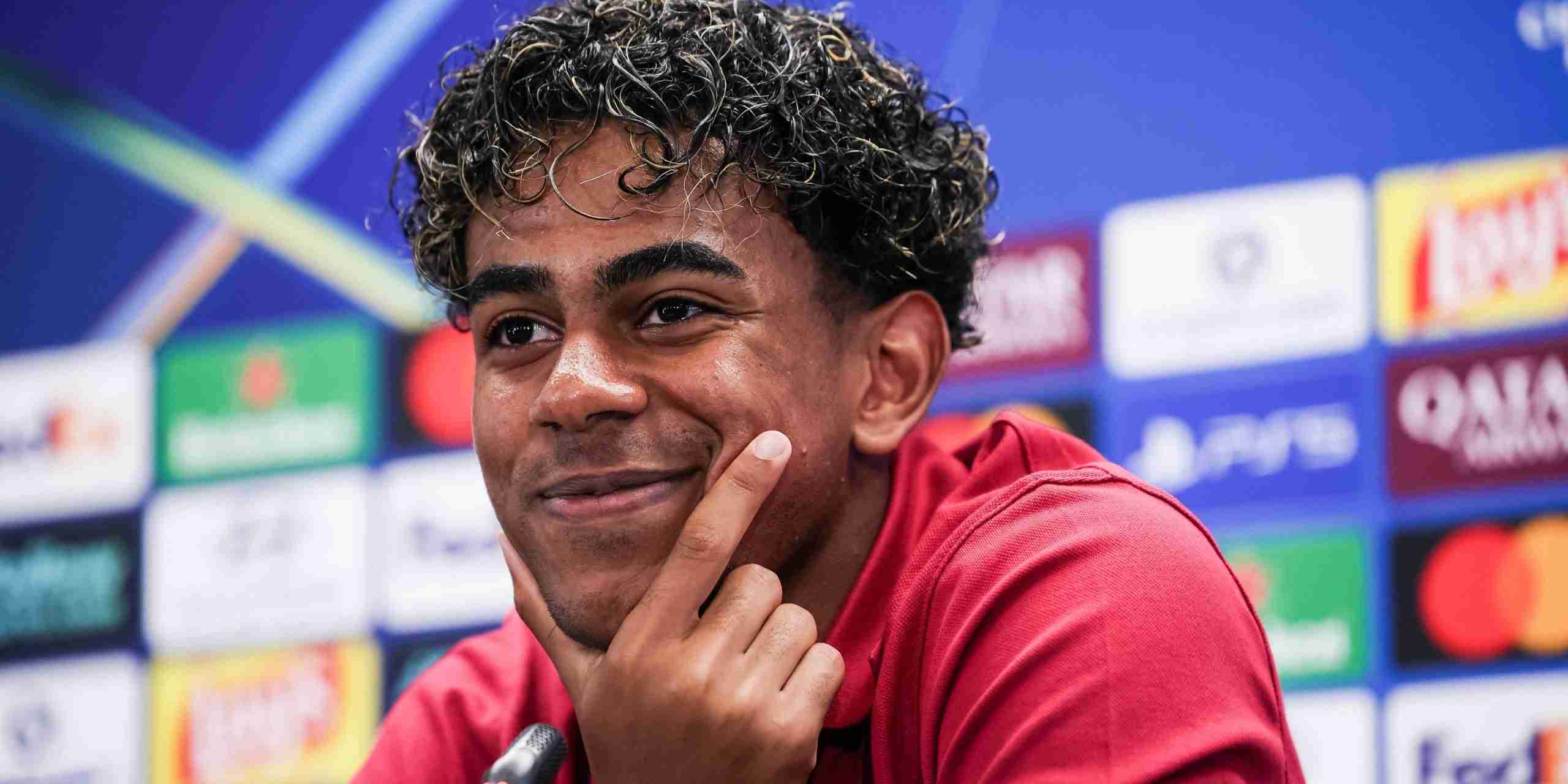 Lamine Yamal smiling during a press conference