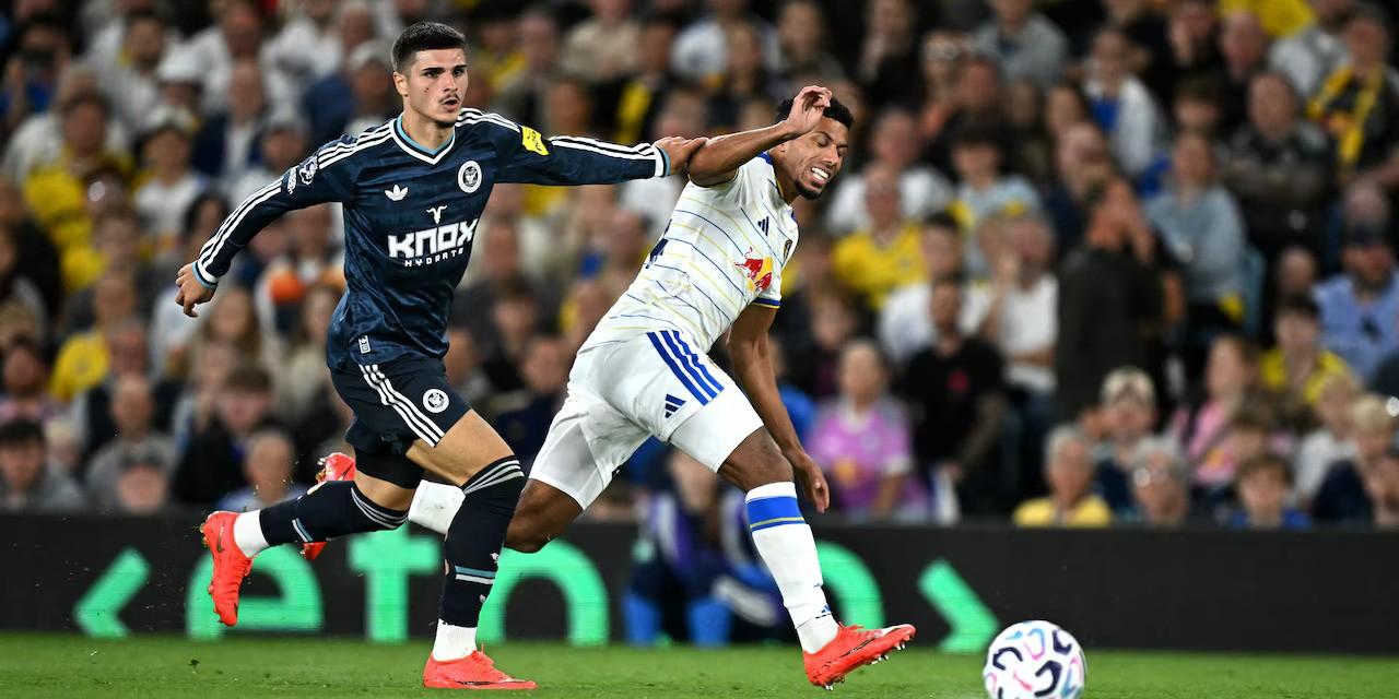 Newcastle and Leeds players in a battle for the ball