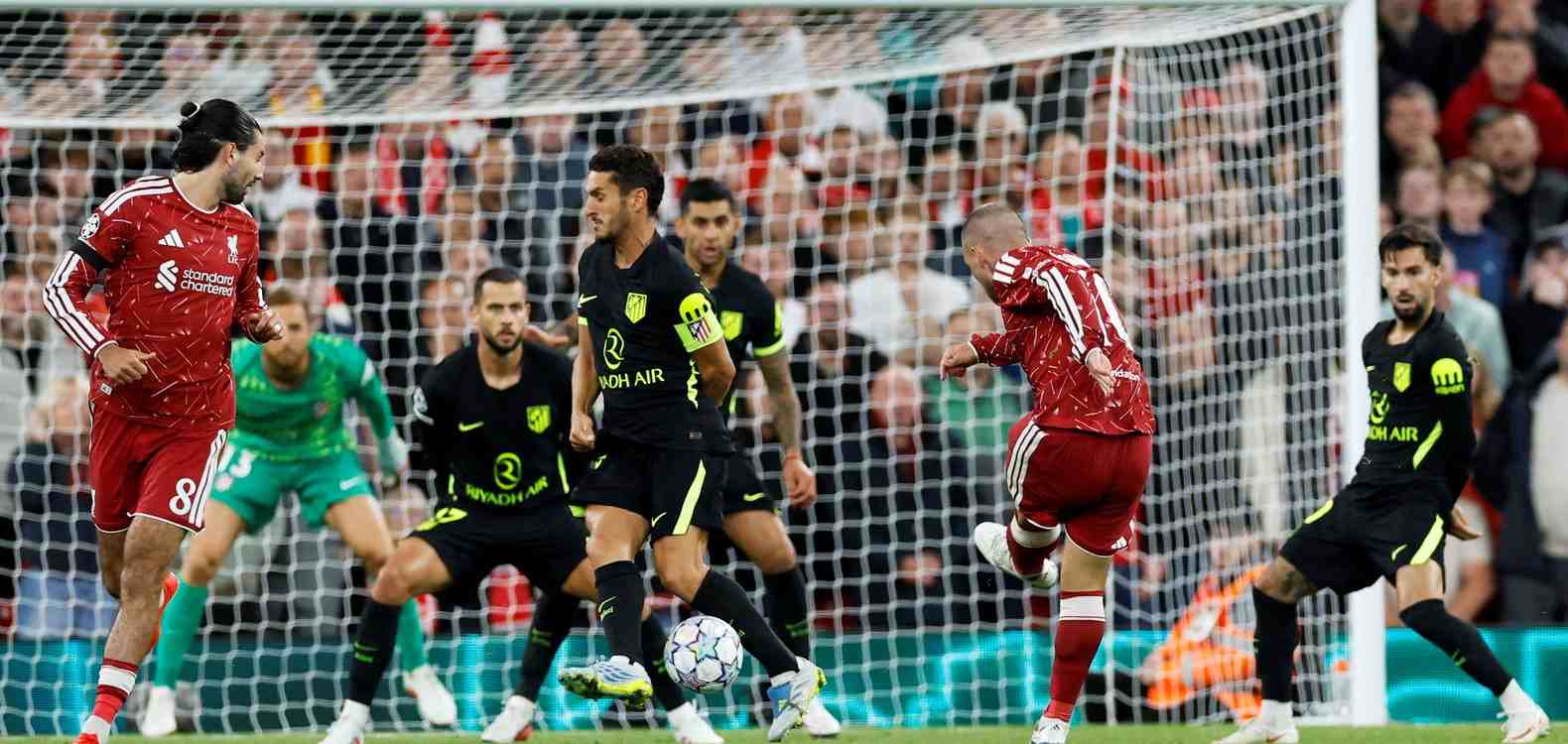 Alexis Mac Allister shoots towards Atletico Madrid's goal
