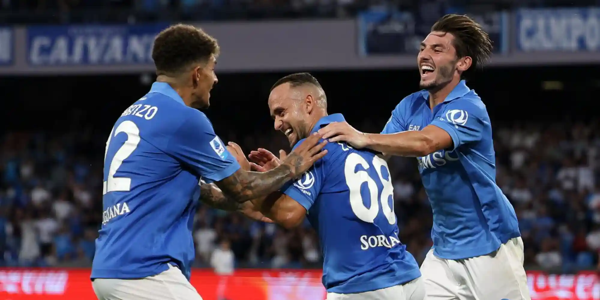 Napoli players congratulate Stanislav Lobotka after his goal against Bologna