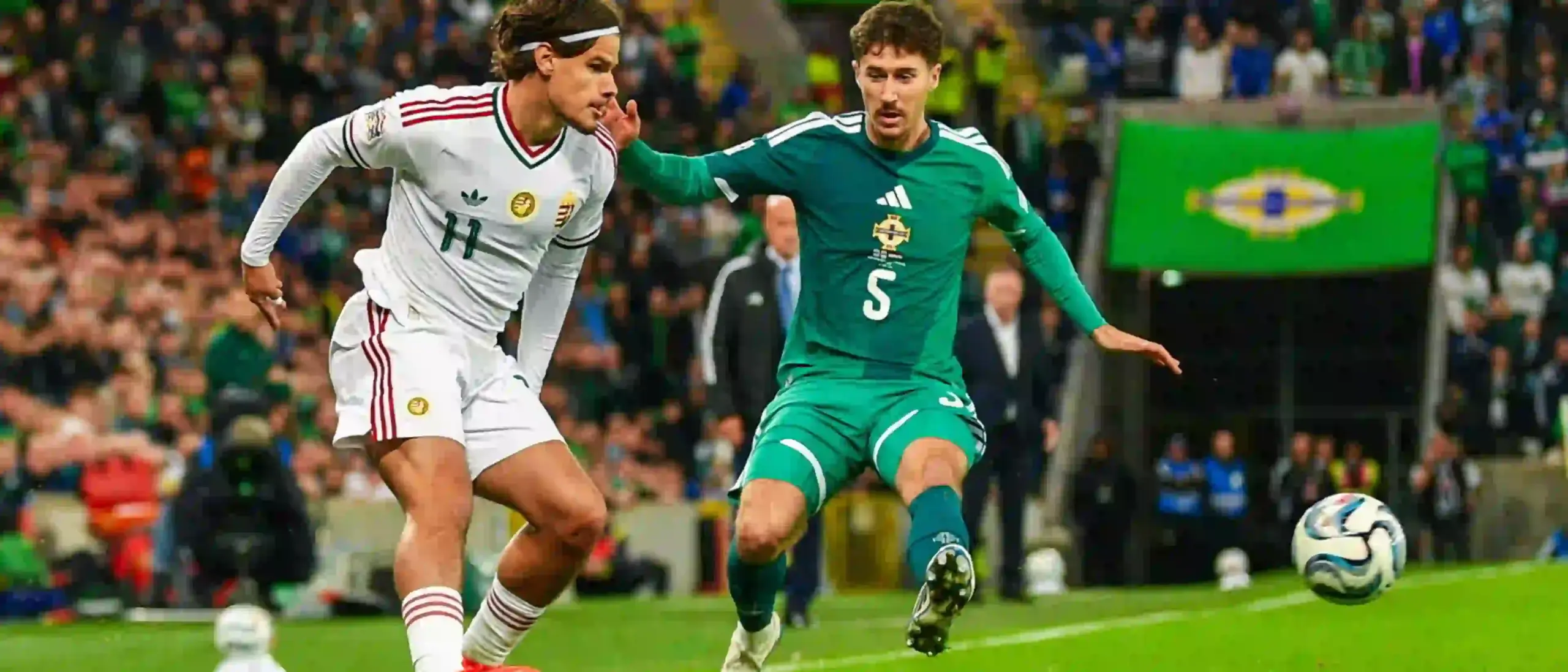 Northern Ireland and Hungary players in a battle for the ball