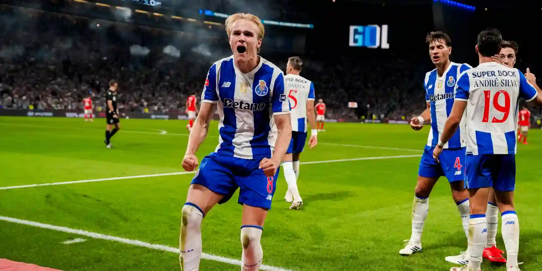 Porto players celebrate after scoring against Benfica