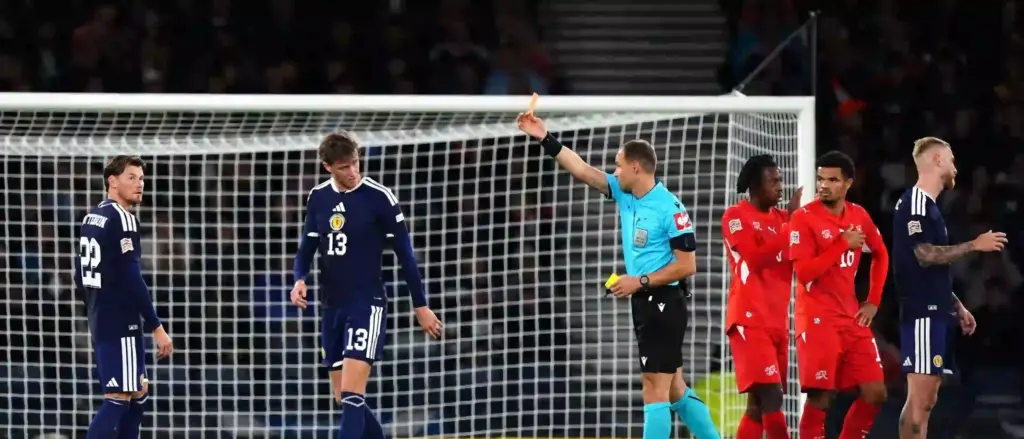 Jack Hendry being shown red card by the referee