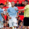 Players and referee waiting VAR to confirm whether Haaland's goal should stand