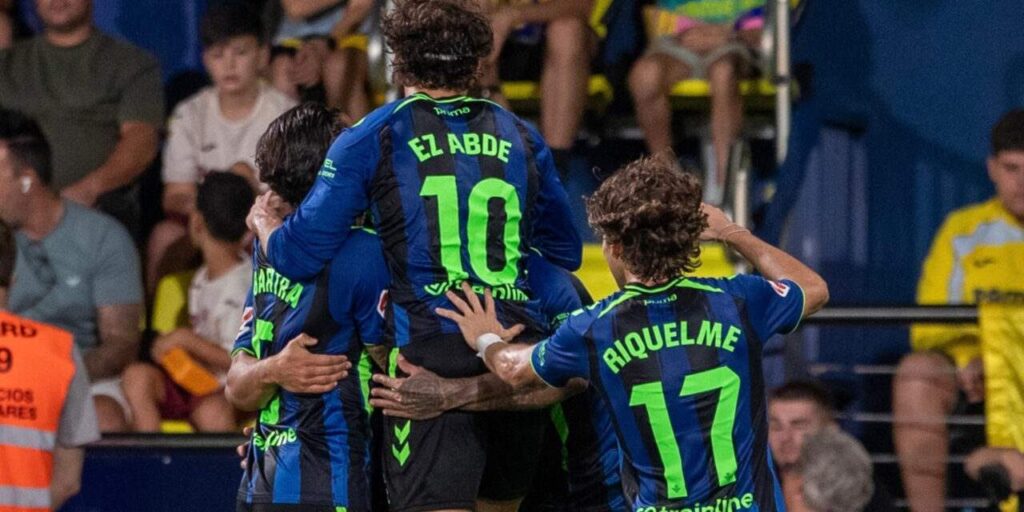 Betis players celebrate after scoring against Villarreal