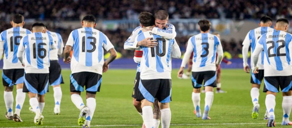 Argentina players celebrate after scoring against Bolivia in a friendly