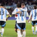 Argentina players celebrate after scoring against Bolivia in a friendly