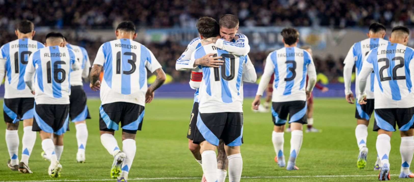Argentina players celebrate after scoring against Bolivia in a friendly