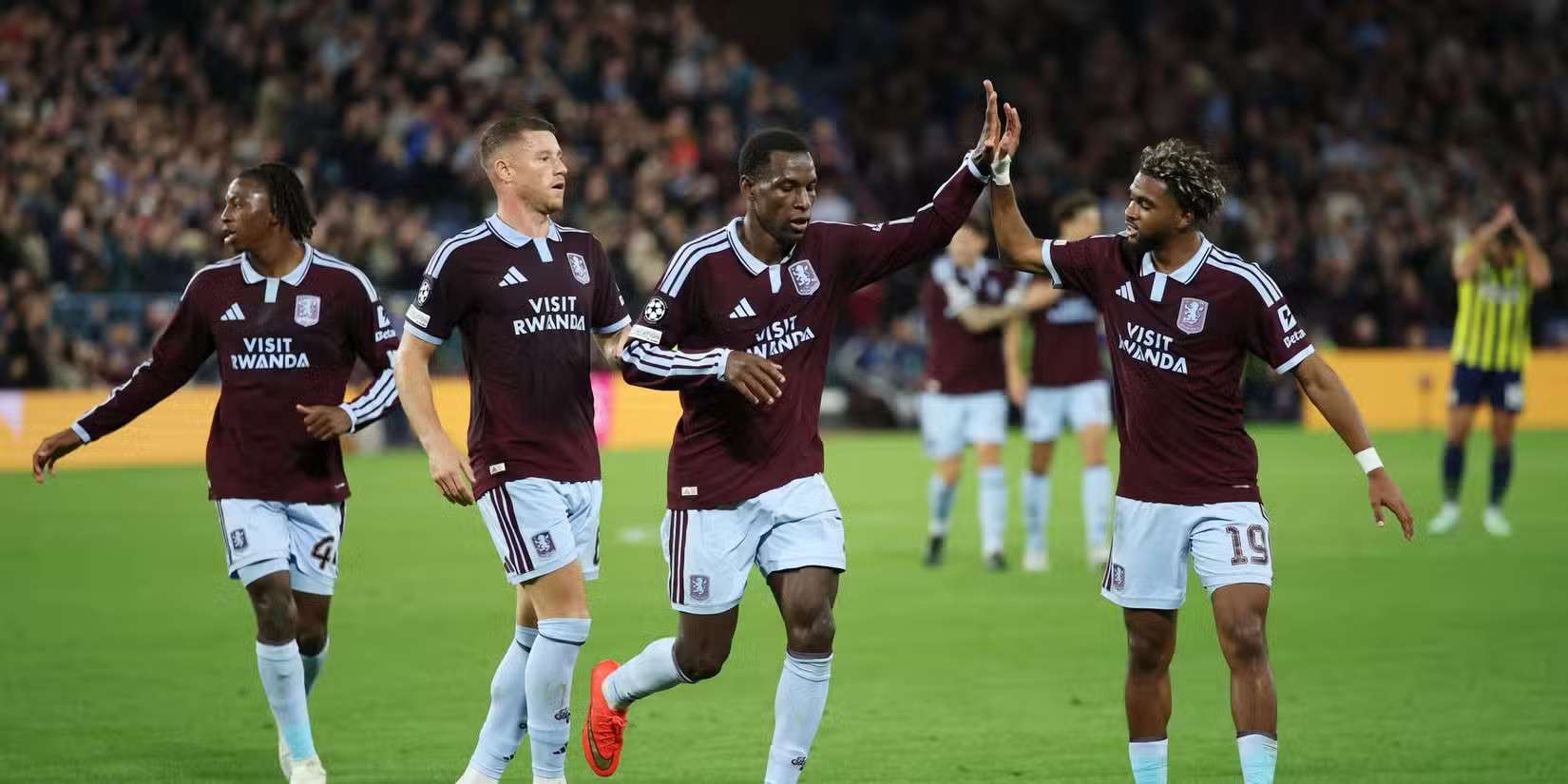 Aston Villa players celebrate after scoring against Fenerbahce