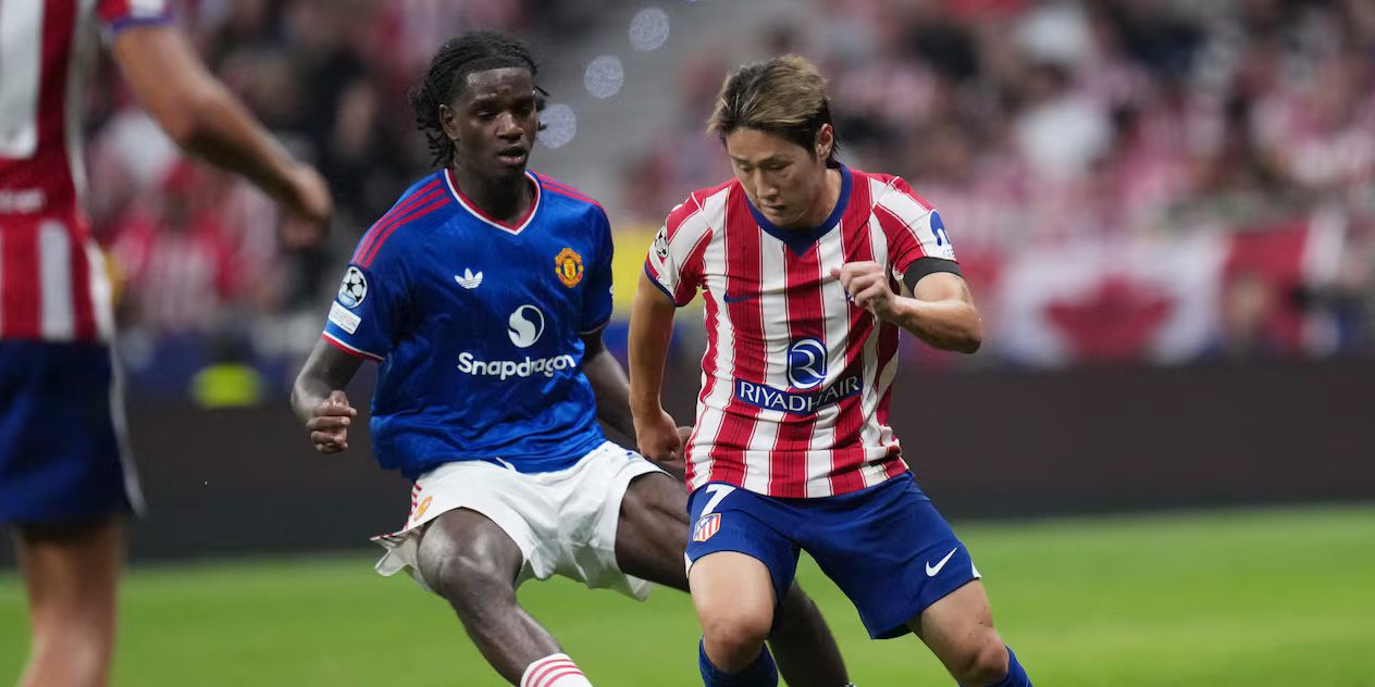Lee Kang-in trying to dribble past Ayden Heaven