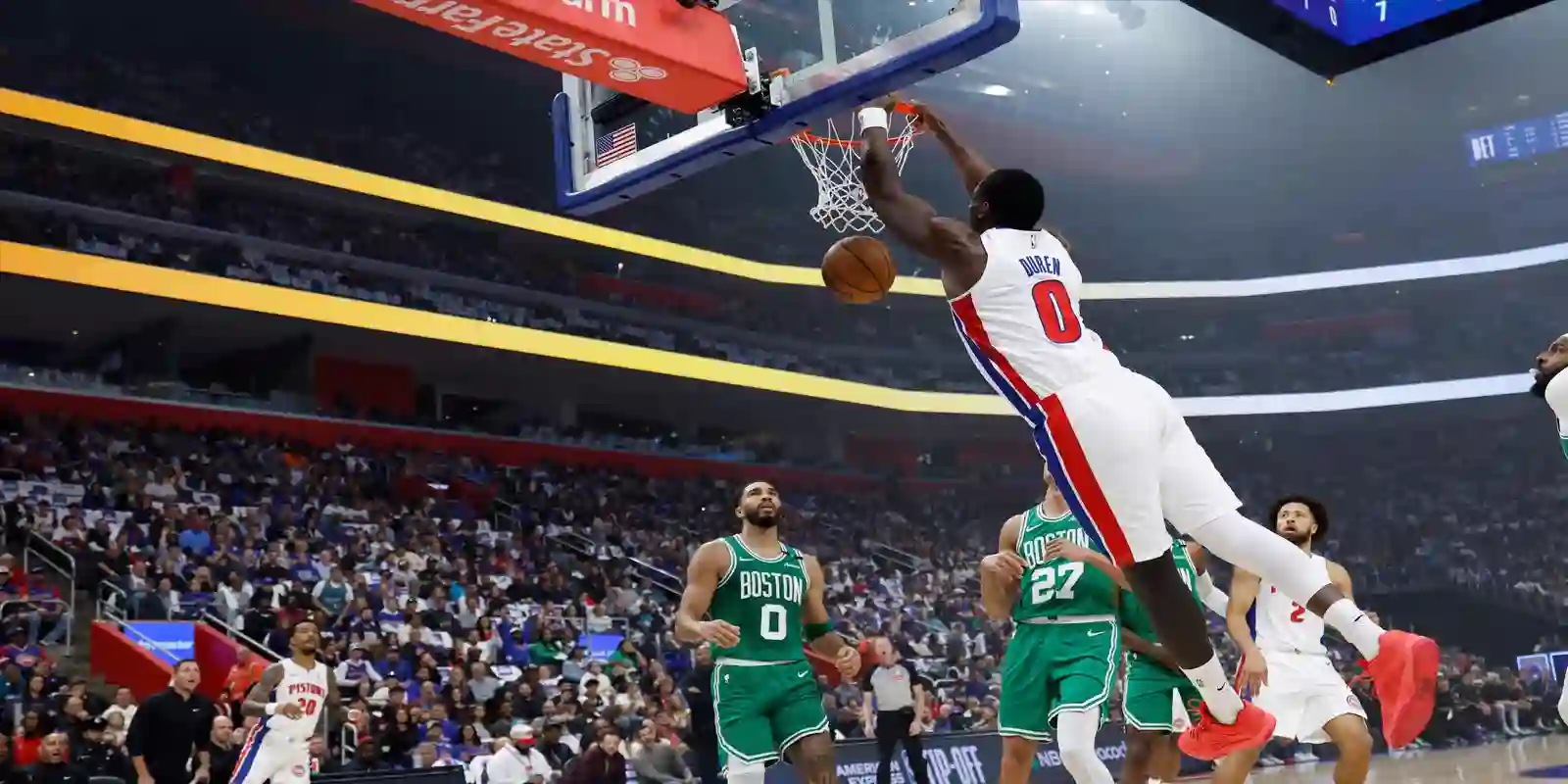 Jalen Duren dunking the ball in Boston Celtics' basket