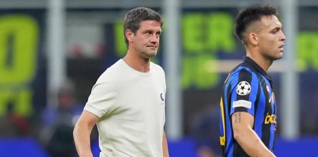 Cristian Chivu and Lautaro Martinez walking after Inter's 4-3 loss to Club Brugge